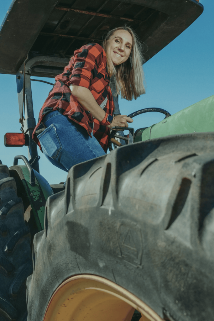 Image of woman on tractor